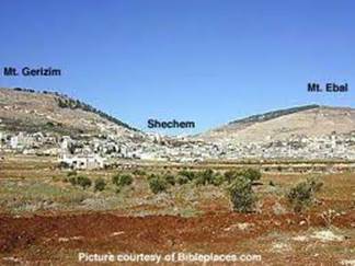 Shechem between Mount Eval and Mount Gerizim.